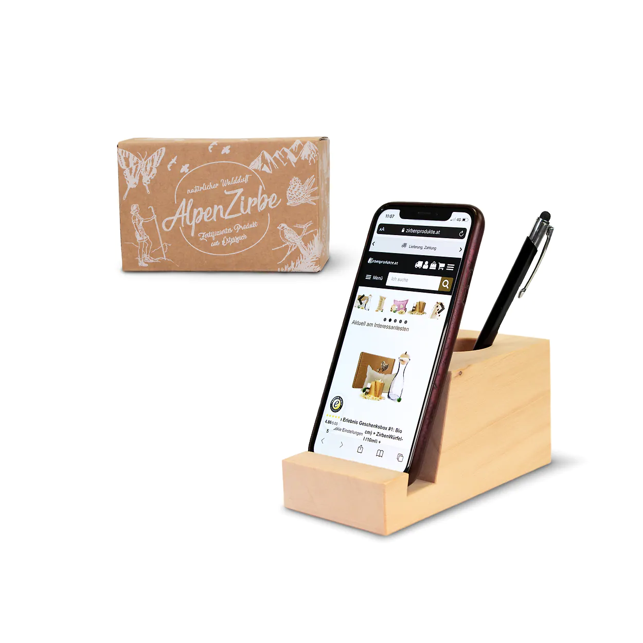 Smartholder aus Zirbenholz mit Handy und Stift.